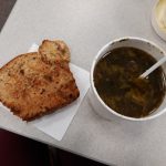 Bread and soup shown on a table